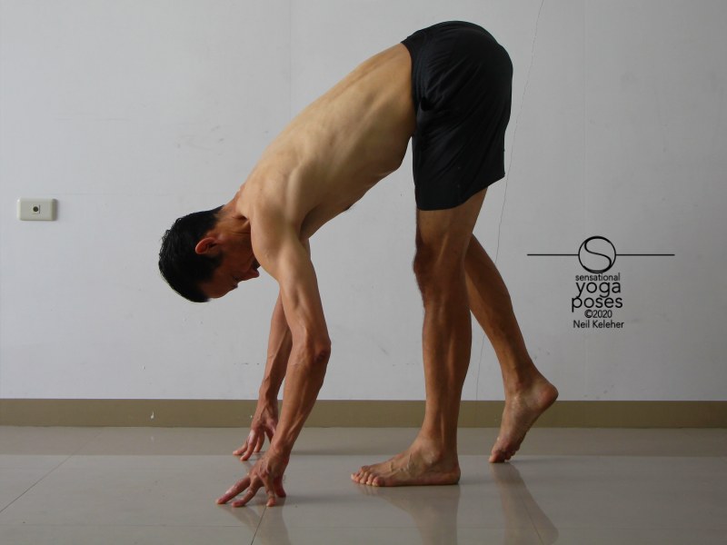Standing forward bend focusing on one leg. Neil Keleher, Sensational Yoga Poses.