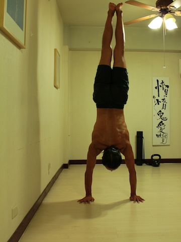 a slightly learning handstand