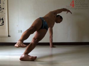 Balancing in Side plank pose with top foot lifted. Neil Keleher. Sensational Yoga Poses.