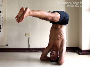 Balancing in bound headstand with legs straight and at 90 degrees.. Neil Keleher. Sensational Yoga Poses.