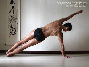 Side plank arm supported balance pose. Neil Keleher, Sensational Yoga Poses.