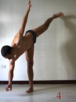 Knee strengthening exericses: half moon pose with knees active and hand lifted.