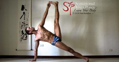 Side plank pose with big toe of top foot grabbed. Neil Keleher, Sensational Yoga Poses.