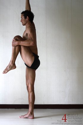 standing with knee to chest. Neil Keleher. Sensational Yoga Poses.