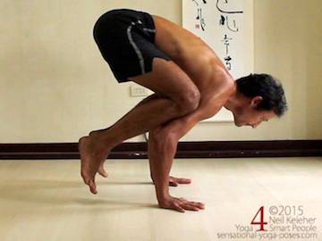 bakasana, bakasana preparation position, feet close to floor, yoga poses, yoga postures, arm balancing yoga poses, arm balancing yoga postures, arm strengthening yoga poses, abdominal strengthening yoga poses, yoga balance poses, balance exercises