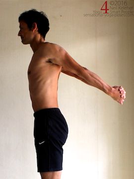 Hands clasped and arms stretching back from down position, neil keleher, sensational yoga poses.