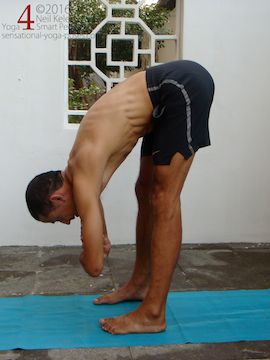 Yoga poses for abs, relaxed Standing forward bend to relax the abs, neil keleher, sensational yoga poses.