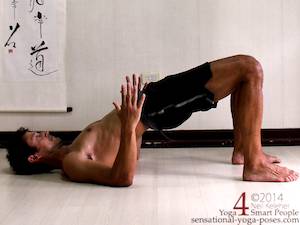 bridge yoga pose for shoulder and ribcage awareness.