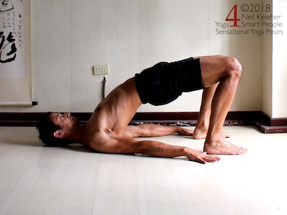 Leg strengthening exercises for the glutes: pushing your feet into the floor to lift your pelvis higher in bridge pose.  Neil Keleher. Sensational Yoga Poses.