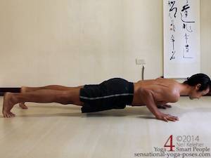 chaturanga dandasana yoga pose, using serratus anterior to stabilize shoulder blades with elbows bent