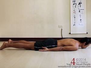yoga poses, yoga postures, laying down with spine long and legs long, belly down laying down