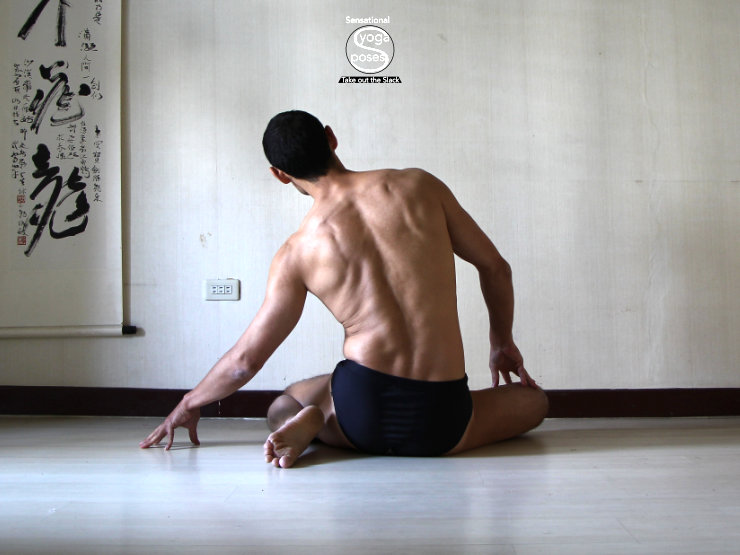 Side bending the spine to streth it in easy bharadvajasana. Neil Keleher, Sensational Yoga Poses.