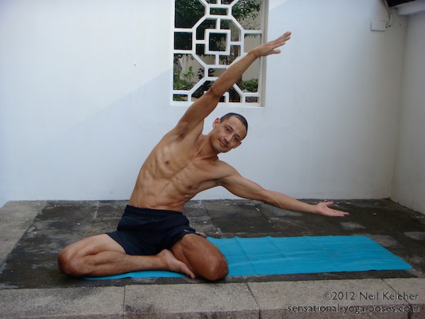 easy bharadvajasana side bend, hero pose variation, kneeling quadriceps stretch.