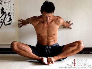 Beginners variation for bending forwards in bound angle pose.