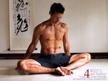 Bound angle pose (baddha konasana) with soles of feet open like a book and torso upright. Neil Keleher, sensational yoga poses.