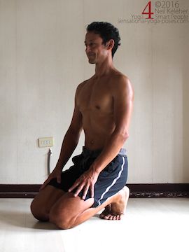 Kneeling with toes tucked under as a preparation for janu sirsasana C. Neil Keleher. Sensational Yoga poses.