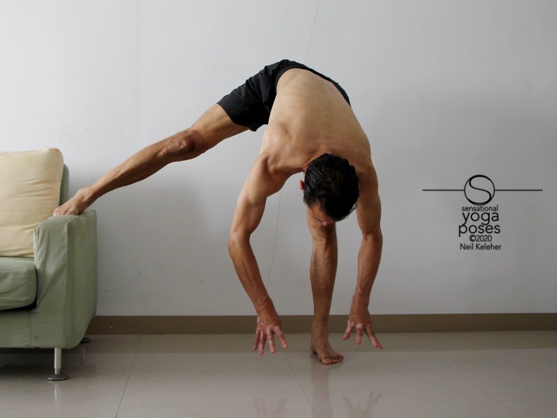 Bending towards standing leg with other leg supported and then lifting hands off of the floor. Neil Keleher, Sensational Yoga Poses.