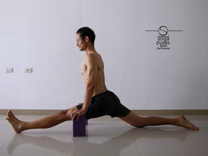 Front to back splits with torso upright and back foot flat on floor. Neil Keleher, Sensational Yoga Poses.