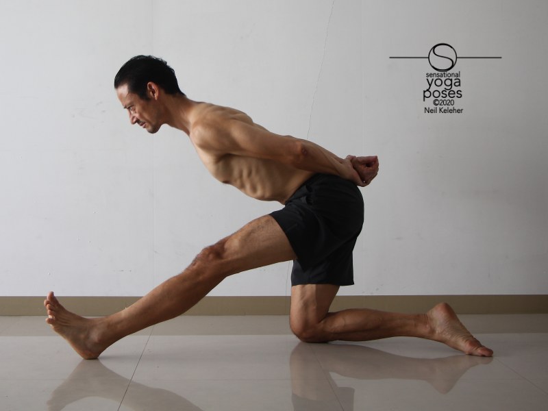 Kneeling on one knee with hips over knee and bending towards straight leg to stretch the hamstrings. Neil Keleher, Sensational Yoga Poses.