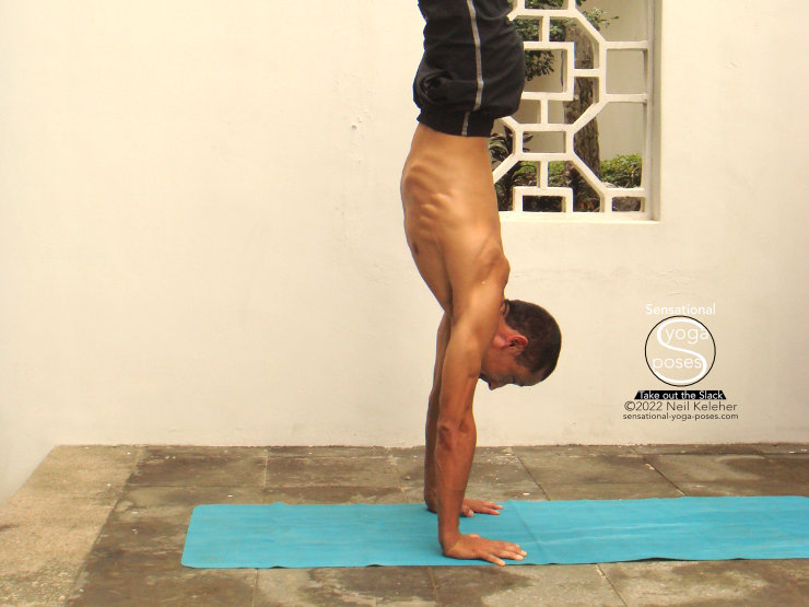 Balancing in handstand. Neil Keleher. Sensational Yoga Poses.