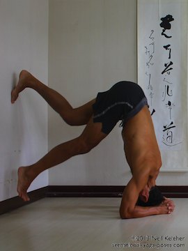 inverted yoga pose, headstand using wall