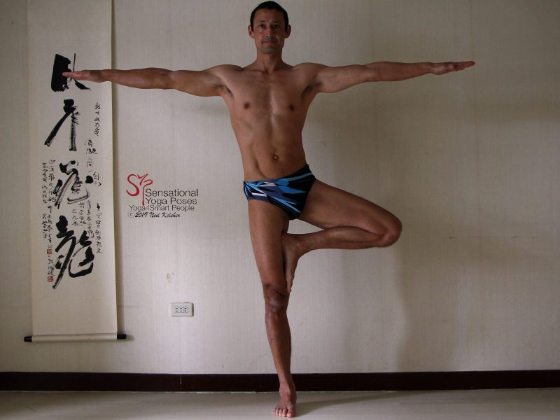 Tree pose hip lift, lifted knee hip lifted. Neil Keleher, Sensational Yoga Poses.