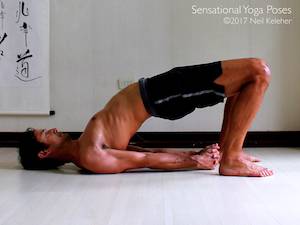 Bridge Yoga pose with hands clasped. Neil Keleher, Sensational Yoga Poses.