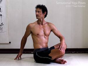 Seated cross legged twist. Neil Keleher, Sensational Yoga Poses.