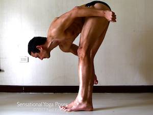 Hip flexor strengthening exercise, bending forward while standing on one leg and pullin the lifted leg forwards. Neil Keleher. Sensational Yoga Poses.