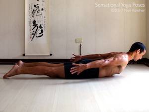 Locust Pose with arms reaching back but legs on the floor. Neil Keleher, Sensational Yoga Poses.