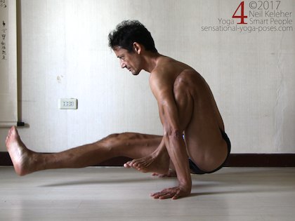 Lifting up from marichyasana a. Neil Keleher. Sensational Yoga Poses.