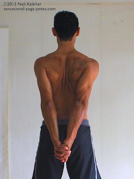 marichyasana shoulder preparation stretch, marichyasana yoga poses, binding yoga poses, seated binding yoga poses, marichyasana type poses