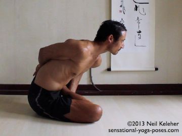 Marichyasana B, a forward bend for both hips. Neil Keleher. Sensational Yoga Poses.