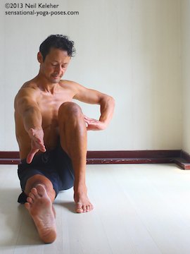 marichyasana c knee position, marichyasana yoga poses, binding yoga poses, seated binding yoga poses, marichyasana type poses
