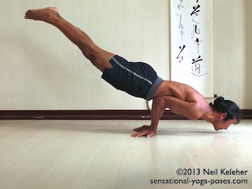 Mayurasana yoga pose. In this yoga pose, hands are on the floor with fingers pointing backwards. Elbows are bent and are close enough together that the stomach can be placed on top of them. Stomach muscles (abdominals) are engaged. With stomach resting on elbows, move torso and elbows forwards relative to the hands till you the point where both legs and chin can be lifted off of the floor. Neil Keleher. Sensational Yoga Poses.