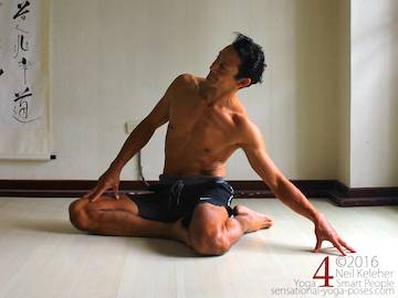 modified bharadvajasana (no lotus) seated side bend Neil Keleher. Sensational Yoga Poses.
