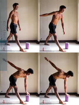 Entering Parvrtta Trikonasana/Twisting Triangle and using yoga blocks. Neil Keleher, Sensational Yoga Poses