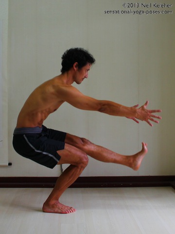 pistol squat halfway up, yoga for strength