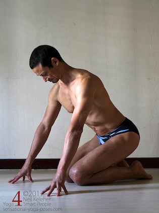 Bending forwards while kneeling and supporting your body with your hands as a prelude to stretching your quadriceps while kneeling. Neil Keleher, Sensational Yoga Poses.