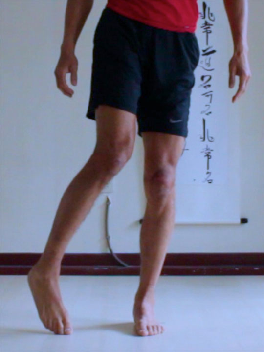 preparation for eagle pose, lifting one side of the pelvis and rotating the leg inwards