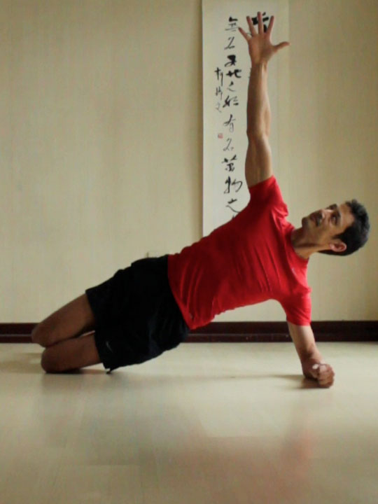 Side Plank or vasisthasana with knees and elbows bent, hips lifted