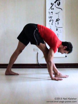 Yoga: Forward fold hands under feet stretch