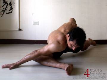 intense pigeon yoga pose, reaching shoulder towards front foot, neil keleher sensational yoga poses.