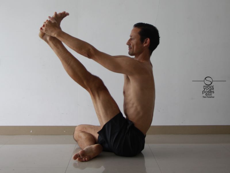 easy compass pose, knee bent, hamstring stretch, knee straight, spine long, yoga pose, head pulled back and up, chin down towards chest.