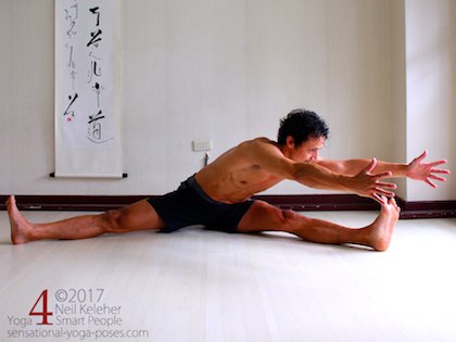 Wide leg forward bend to one leg. Neil Keleher, Sensational Yoga Poses.