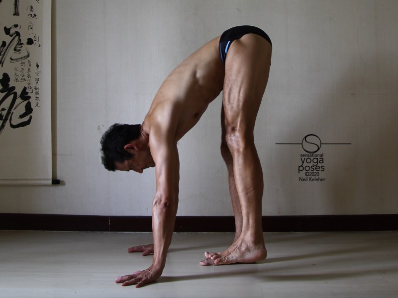Single leg standing forward bend with other leg pulled forwards using hip flexors. Neil Keleher, Sensational Yoga Poses.