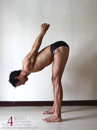 Stanidng forward bend with hands clasped behind back, elbows straight. Neil Keleher. Sensational Yoga Poses.