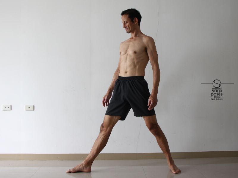 Using triangle yoga pose to stretch the hamstrings Neil Keleher, Sensational Yoga Poses.