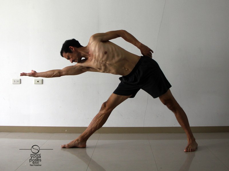 triangle pose hamstring stretch with bottom hand reaching to the side. Neil Keleher, Sensational Yoga Poses.