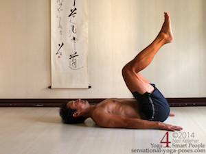 supine, rolling into plow pose.